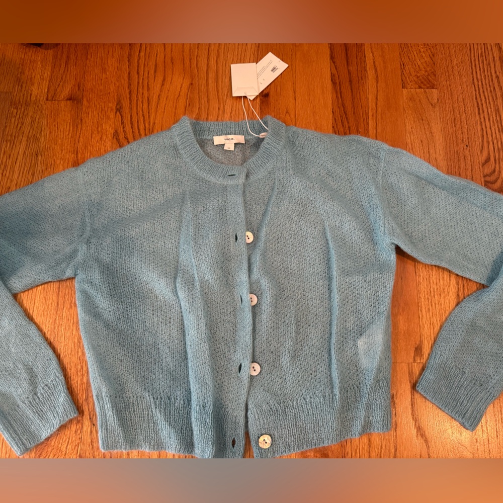 Vince light blue cardigan sweater. New. Never worn.